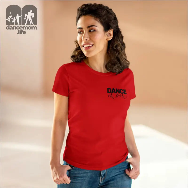 Red t-shirt with ’DANCE’ printed on the chest.