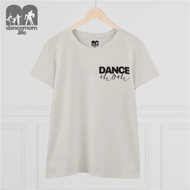 White t-shirt with ’DANCE’ text printed on the front.