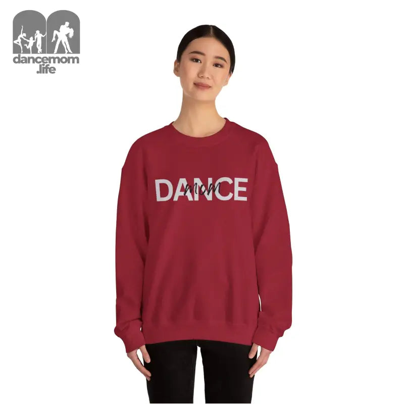 Burgundy crewneck sweatshirt with ’DANCE’ text printed across the chest.