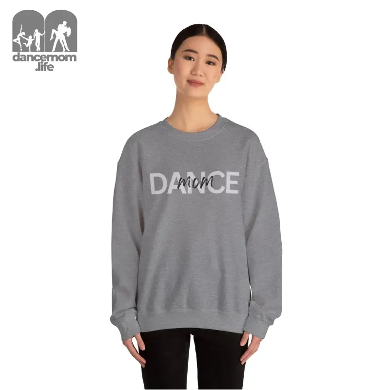 Gray crewneck sweatshirt with ’DANCE’ text printed on the front.