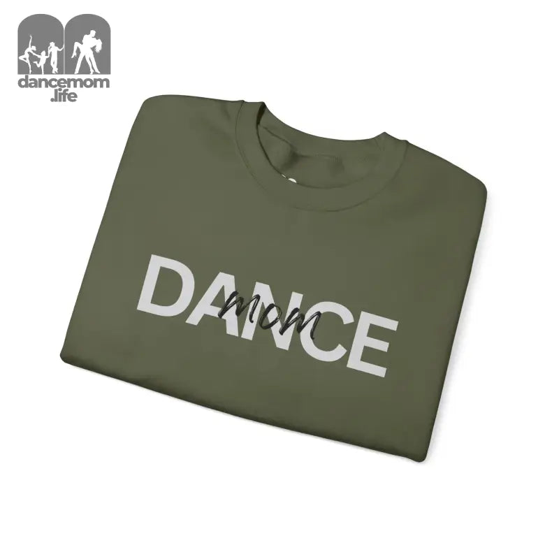 Olive green t-shirt with ’DANCE’ text featuring a silhouette of dancers in the middle.