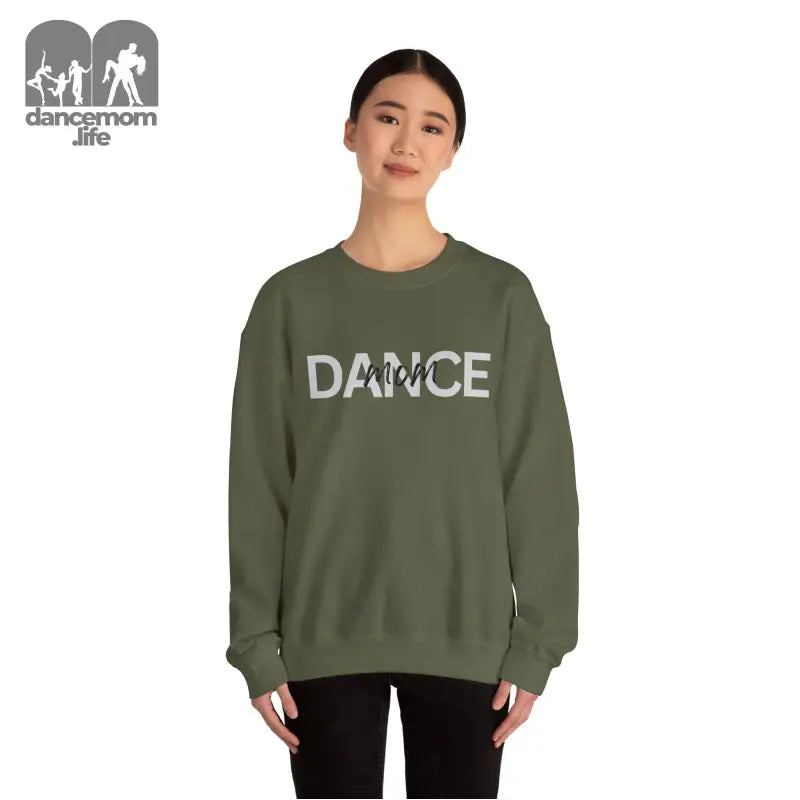 Olive green sweatshirt with ’DANCE’ text printed across the chest.