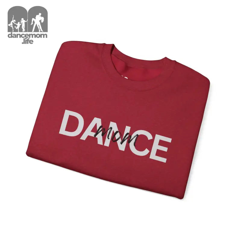 Red sweatshirt with ’DANCE’ text printed in white letters.