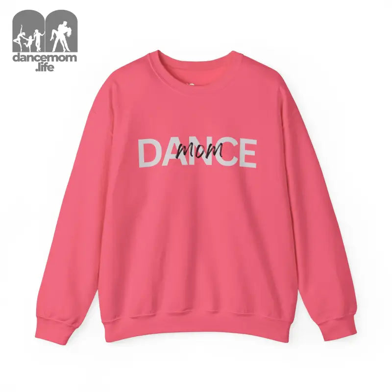 Pink sweatshirt with ’DANCE’ text design in gray and black lettering.