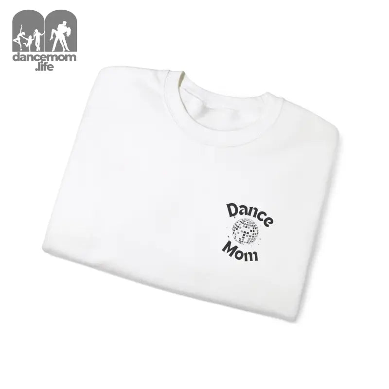 White t-shirt with ’Dance Mom’ text and a small circular design printed on it.