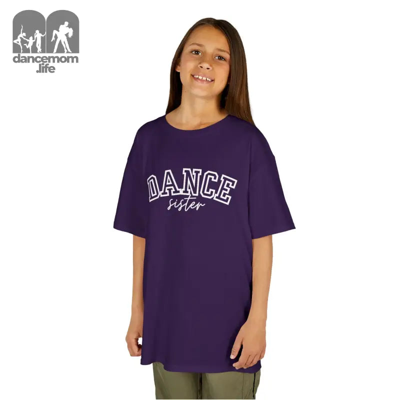 Purple t-shirt with ’DANCE’ text printed on the front.