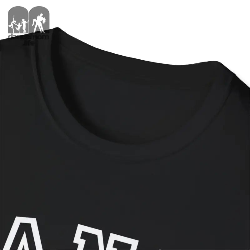 Black t-shirt with white text visible on the front.