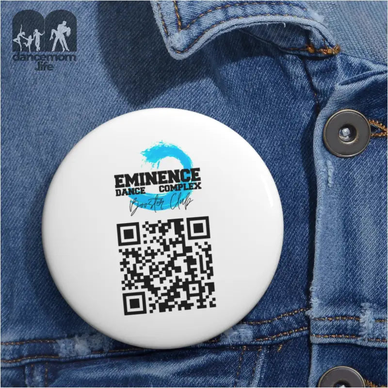 White circular button pin featuring an ’Eminence’ logo and QR code.