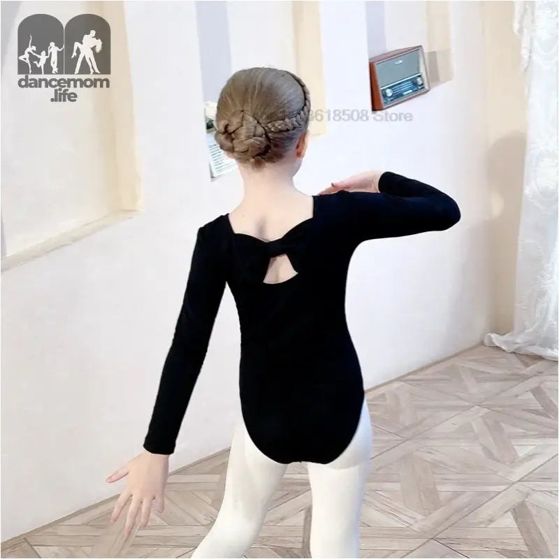 Black long-sleeved ballet leotard with a keyhole back detail.