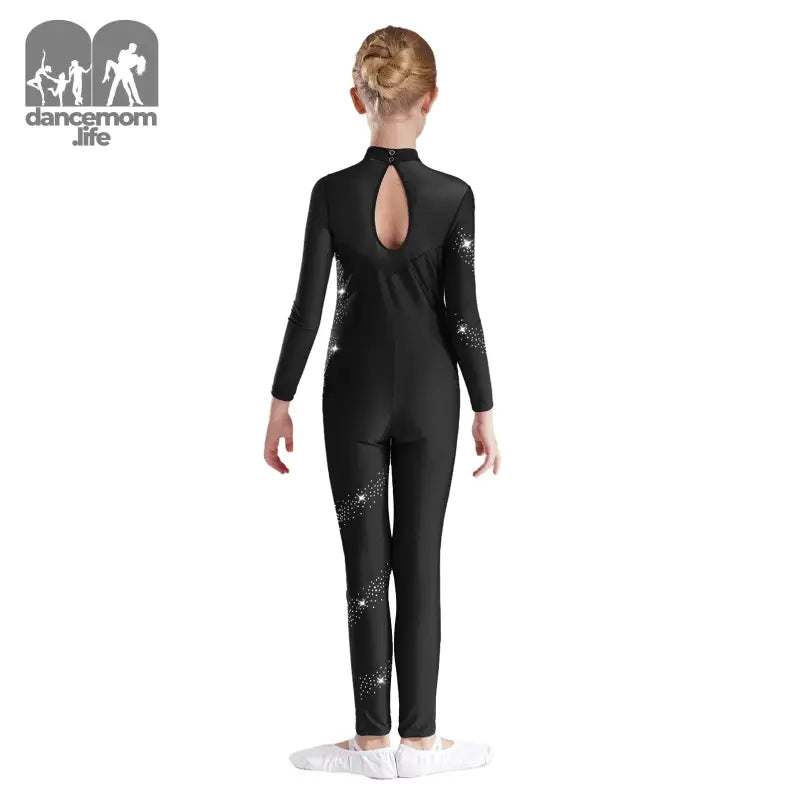 Black long-sleeved dance unitard with sparkly star accents and a keyhole back.