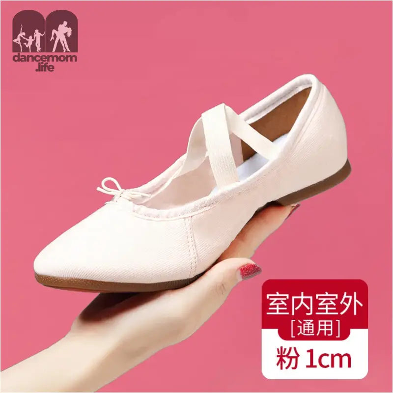 White canvas ballet flat.