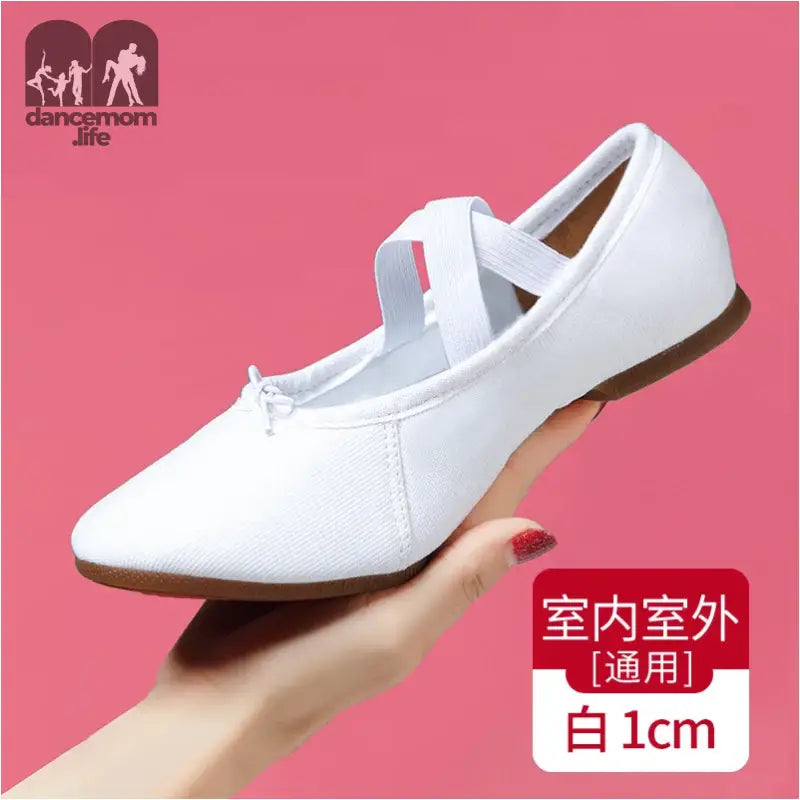 White canvas ballet flat.