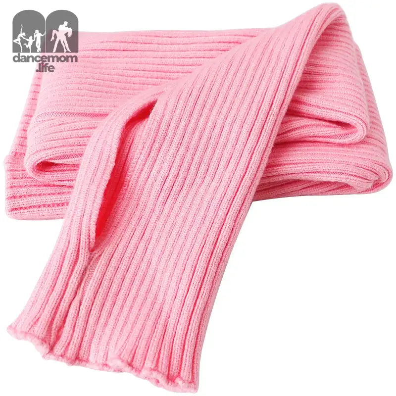 Pink ribbed knit scarf with vertical ridges.