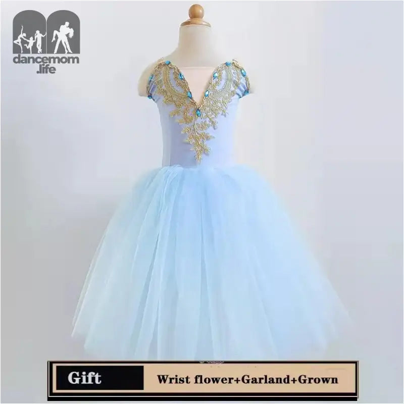 Light blue tulle ball gown with gold embellished bodice and cap sleeves.