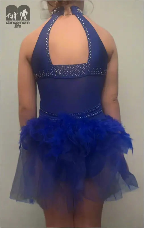 Blue dance costume with a tutu skirt and rhinestone-embellished bodice.