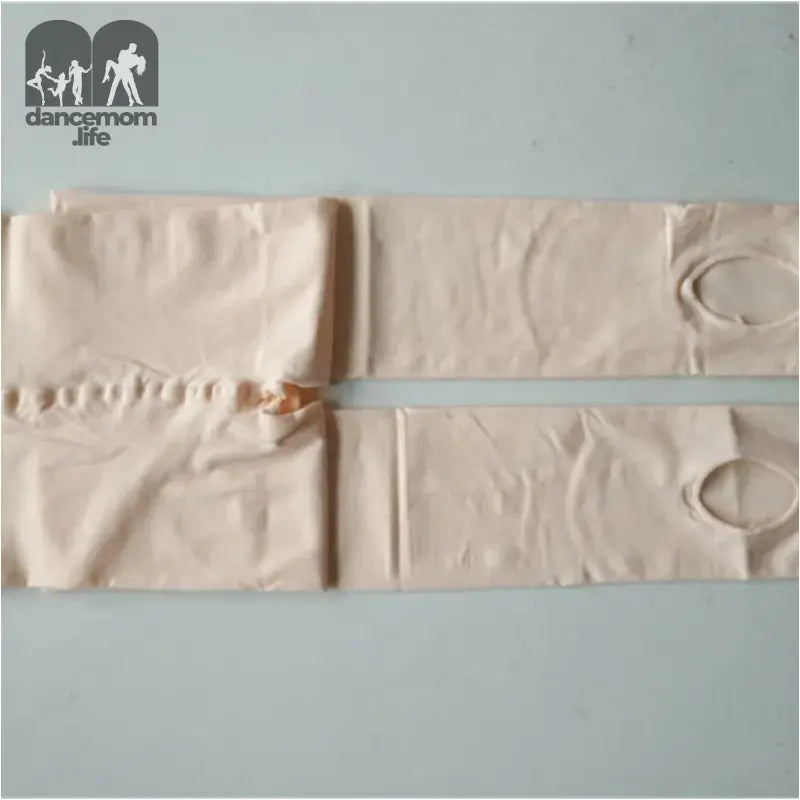 Beige sanitary pad with wings.