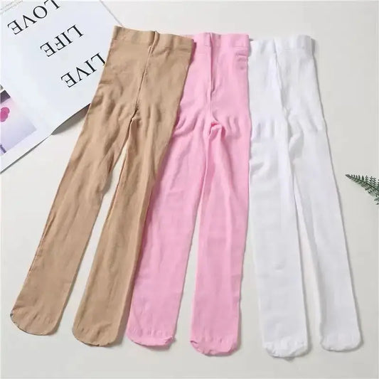 Three pairs of ballet tights in beige, pink, and white colors.
