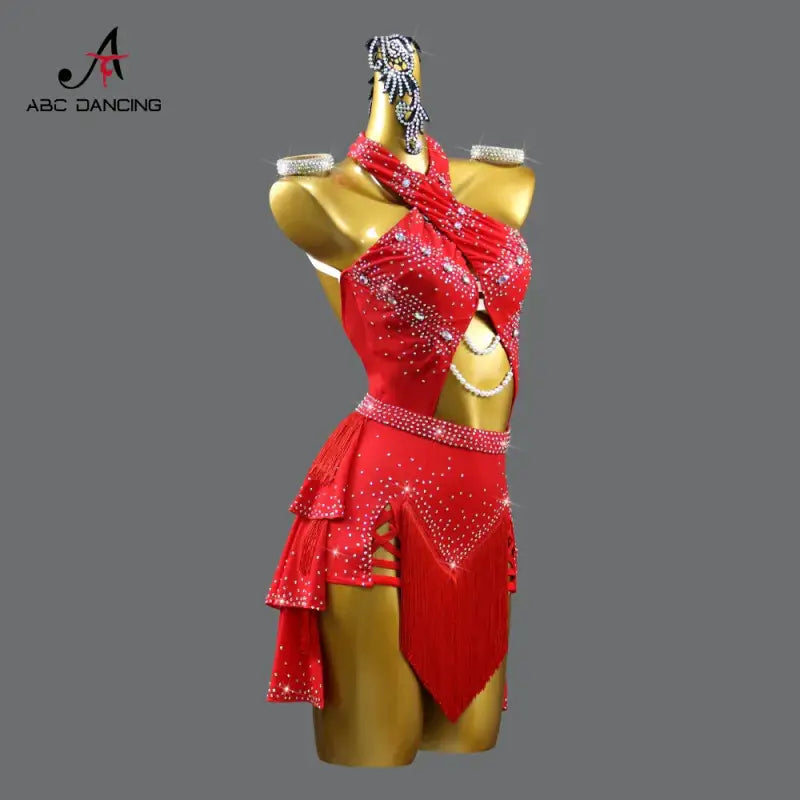 Red, rhinestone-studded ballroom dance dress.