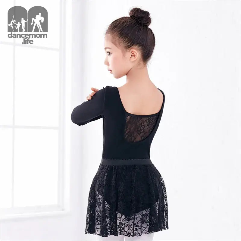 Black ballet leotard with lace skirt and back panel.