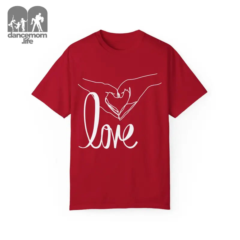 Red t-shirt with white hands forming a heart shape and ’love’ text design.