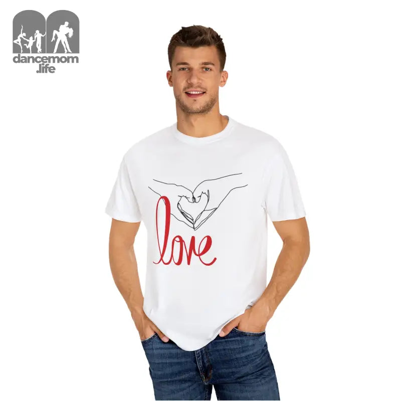 White t-shirt featuring a hand-drawn heart design and ’love’ text graphic.