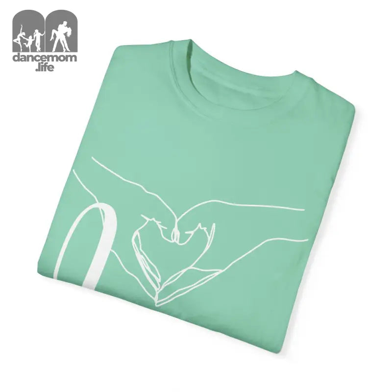 Mint green t-shirt with a white hand-drawn heart design.