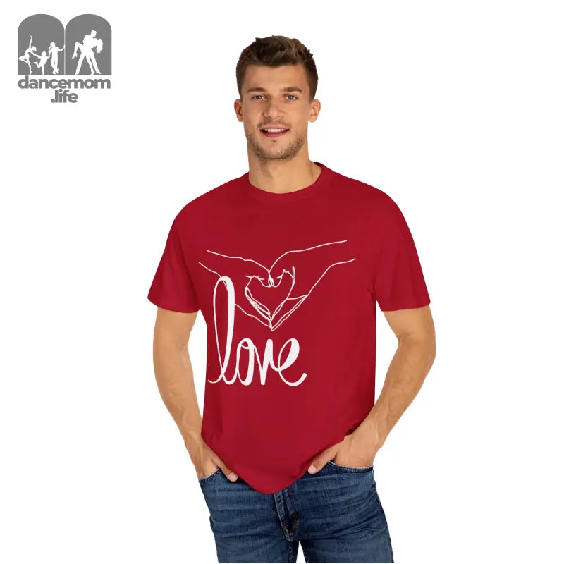 Red t-shirt with white ’love’ text and hand design graphic on the front.