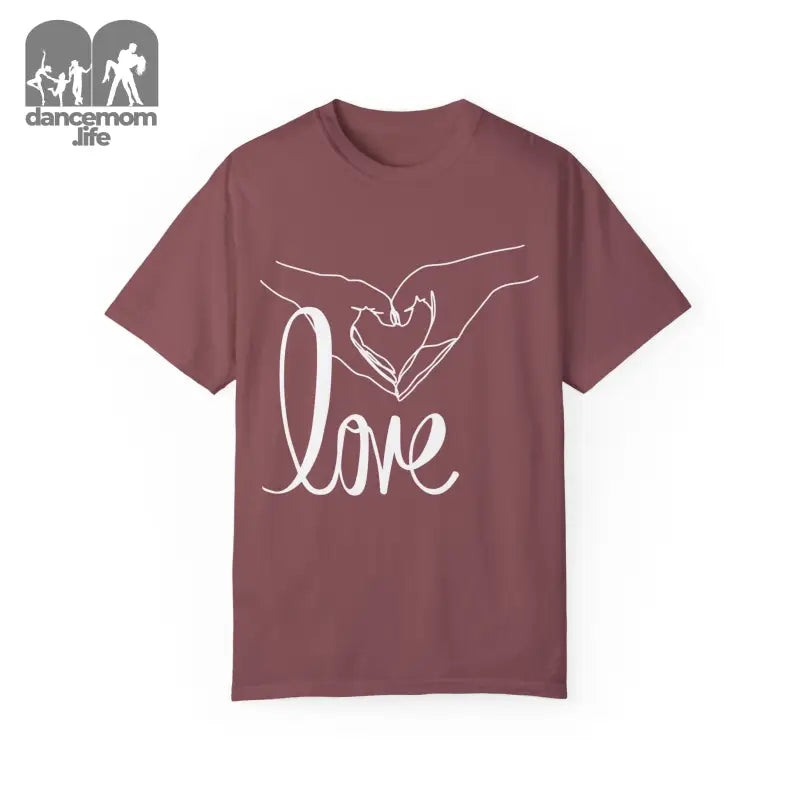 Mauve t-shirt with white hand-drawn heart gesture and ’love’ text design.