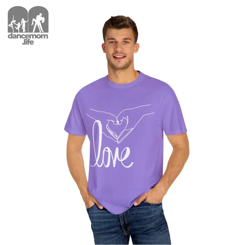 Purple t-shirt with white ’Love’ text and hand design on the front.