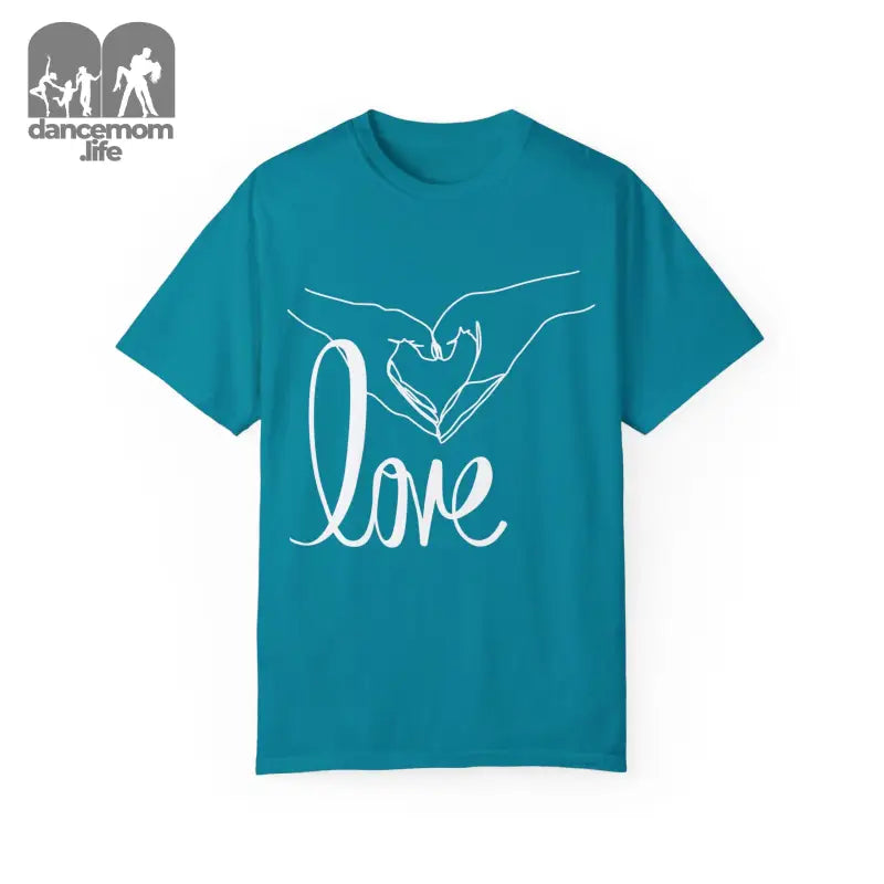 Teal t-shirt with white hands forming a heart shape and ’love’ text design.