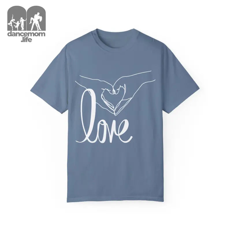 Blue t-shirt with white hand-drawn heart gesture and ’love’ text design.