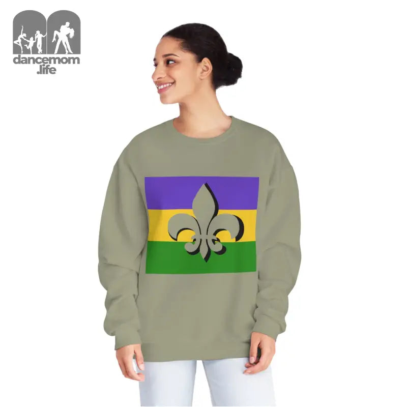 Sage green sweatshirt featuring a Mardi Gras colored fleur-de-lis design.