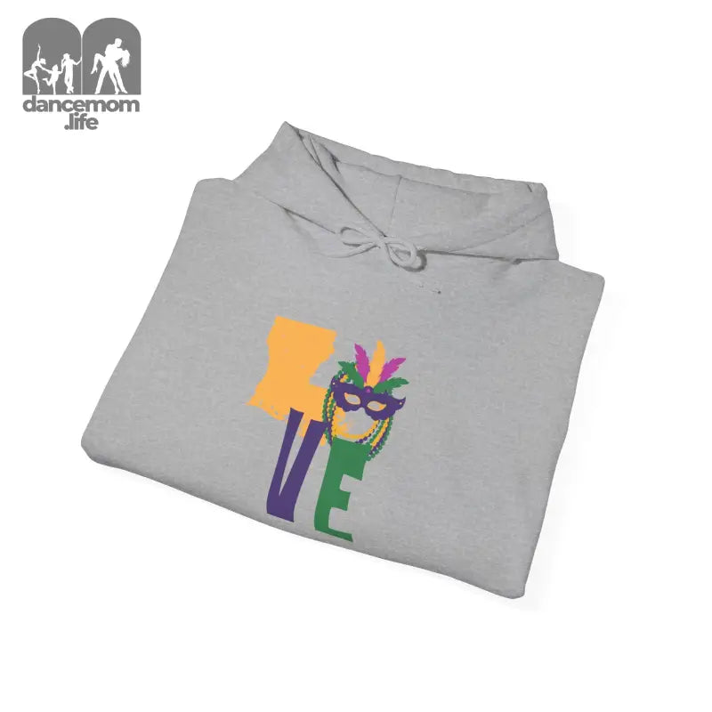 Grey hoodie with colorful ’LOVE’ text and Mardi Gras mask design.