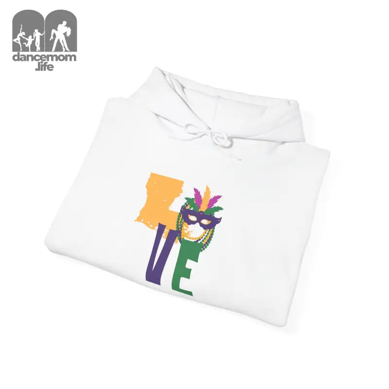 White hoodie sweatshirt with colorful ’LOVE’ text featuring a Mardi Gras mask design.