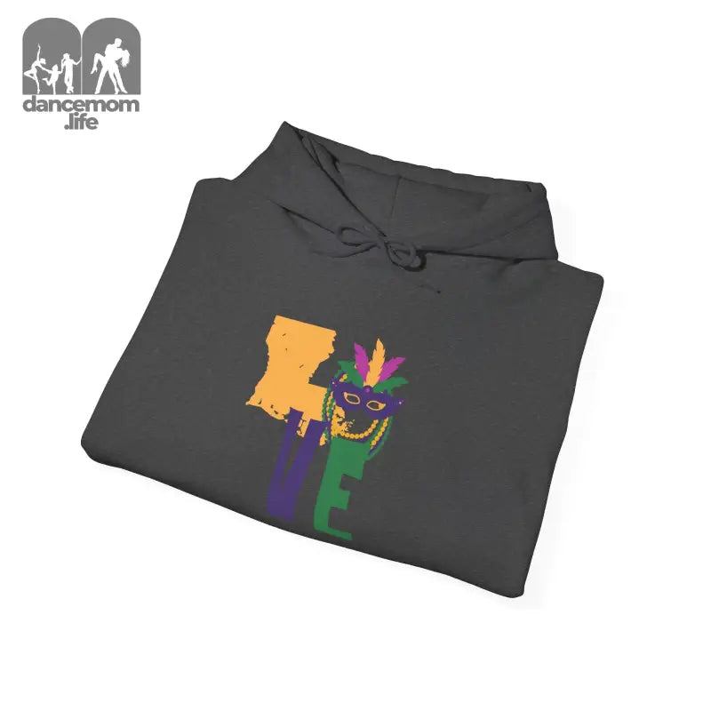 Folded dark gray hoodie with a colorful Louisiana state Mardi Gras design printed on it.