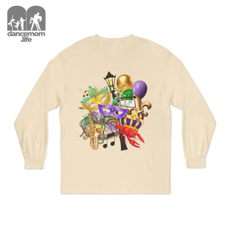 Cream-colored long sleeve t-shirt with a colorful carnival-themed graphic design featuring balloons, music notes, and festive elements.