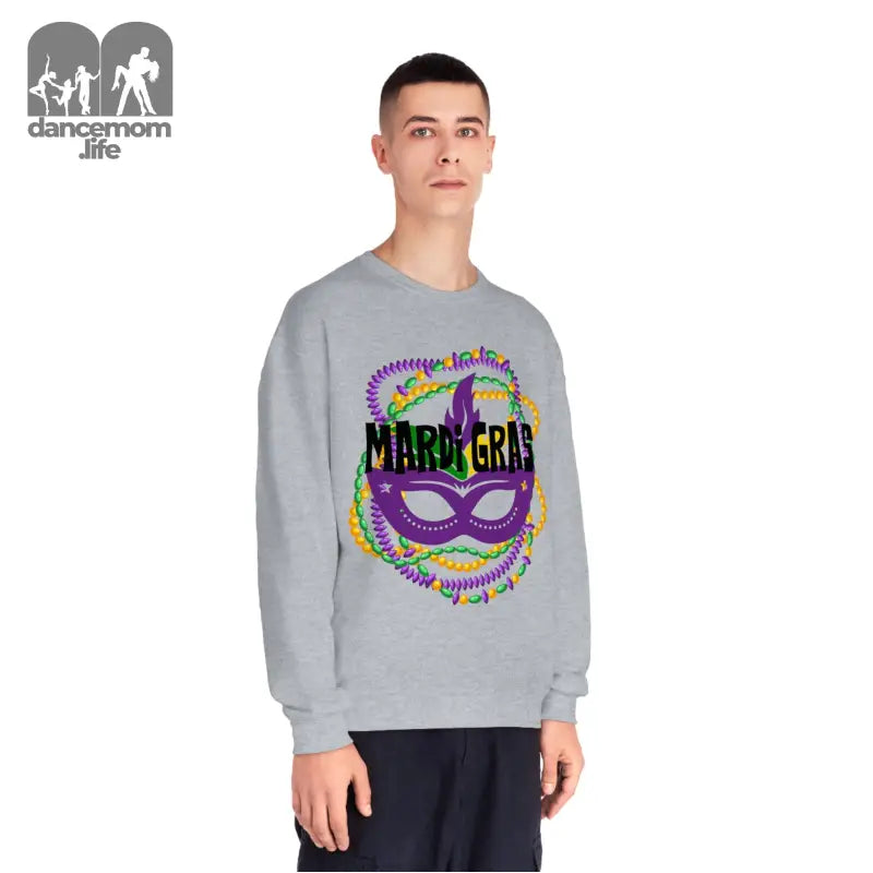 Grey sweatshirt featuring a colorful Mardi Gras carnival mask design with beads and text.