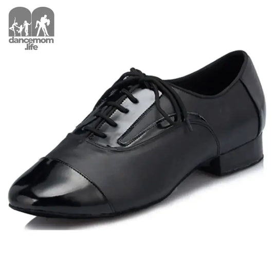Black leather dress shoe.