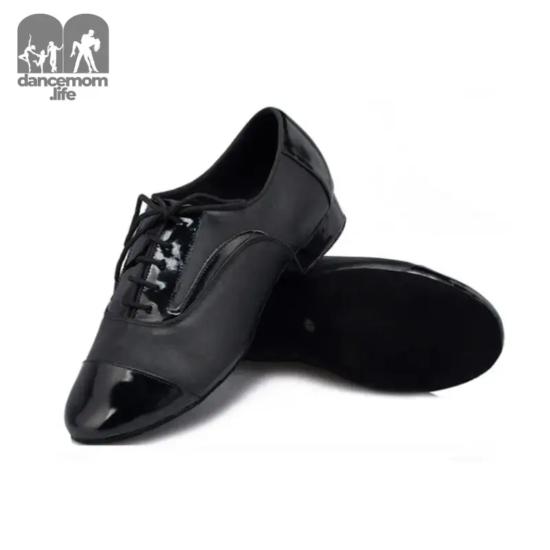 Black leather dance shoes.