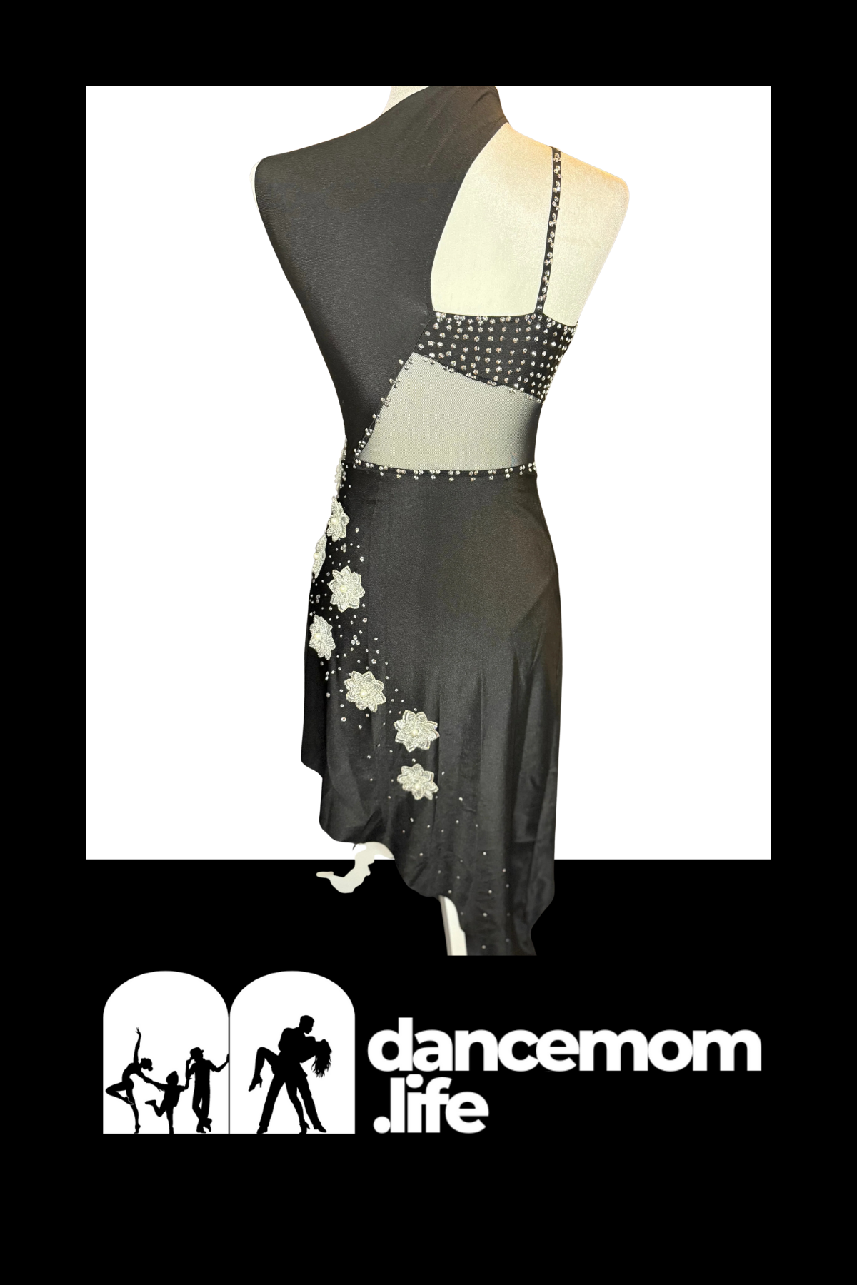 Black dance dress with white floral embellishments and beaded straps.