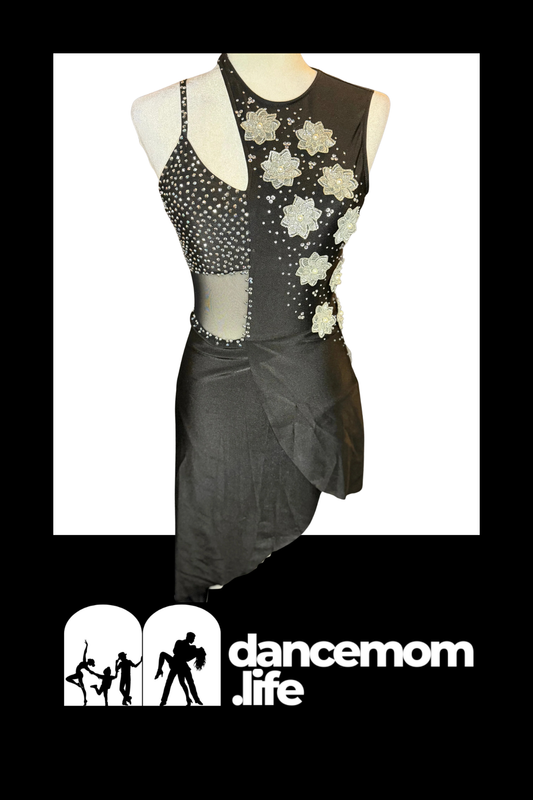 Black dance dress with silver floral embellishments and a sheer panel.
