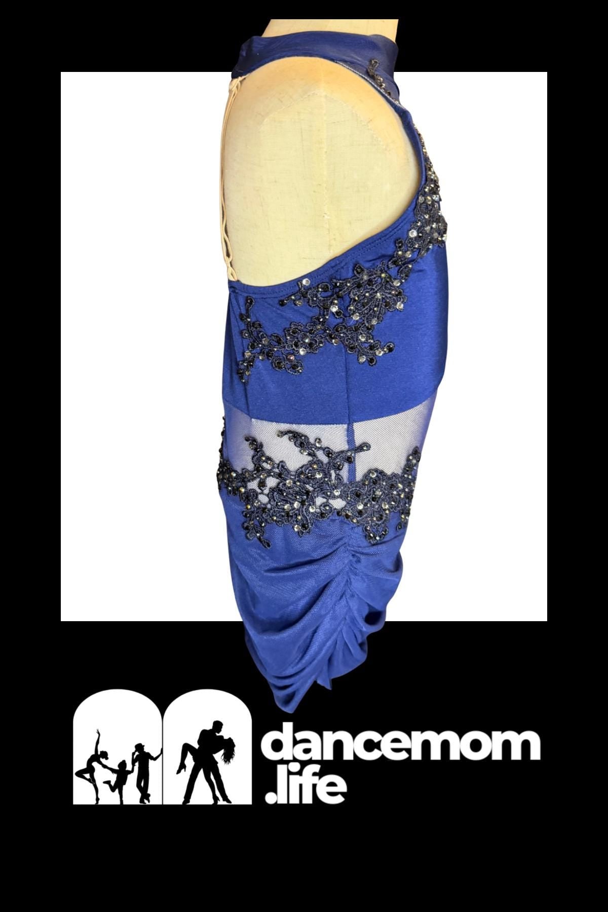 Blue dance dress with sheer panels and black beaded embellishments.