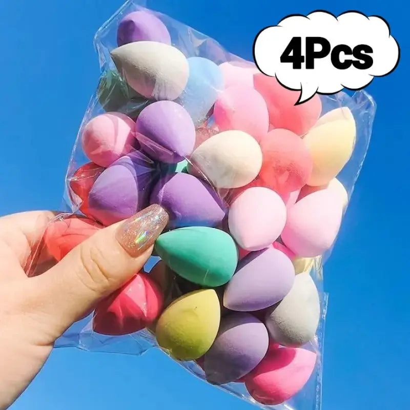 Colorful makeup sponges in a plastic bag.