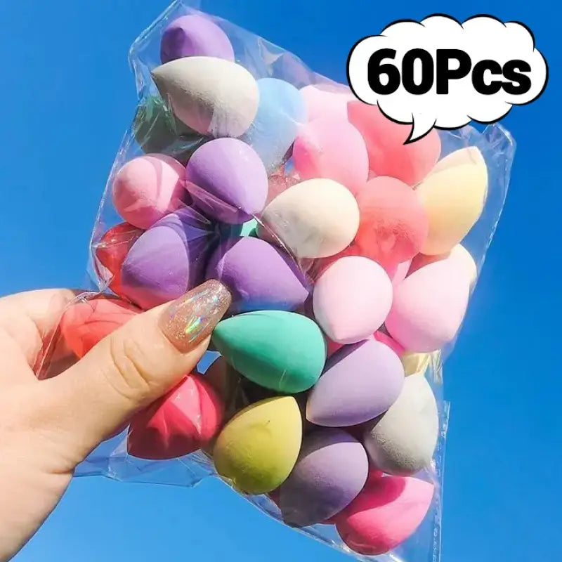 Colorful makeup sponges in a plastic bag.