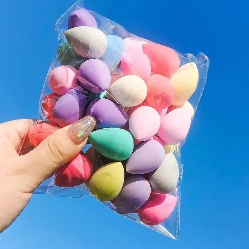 Colorful makeup sponges in a plastic bag.