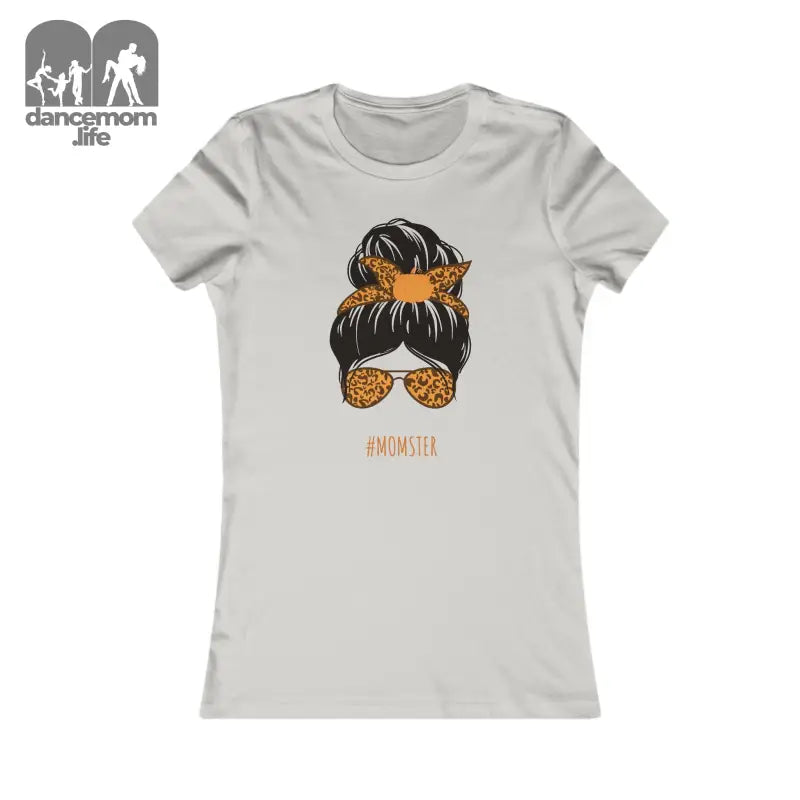 Light gray t-shirt with a messy bun hairstyle and sunglasses design in black and orange.