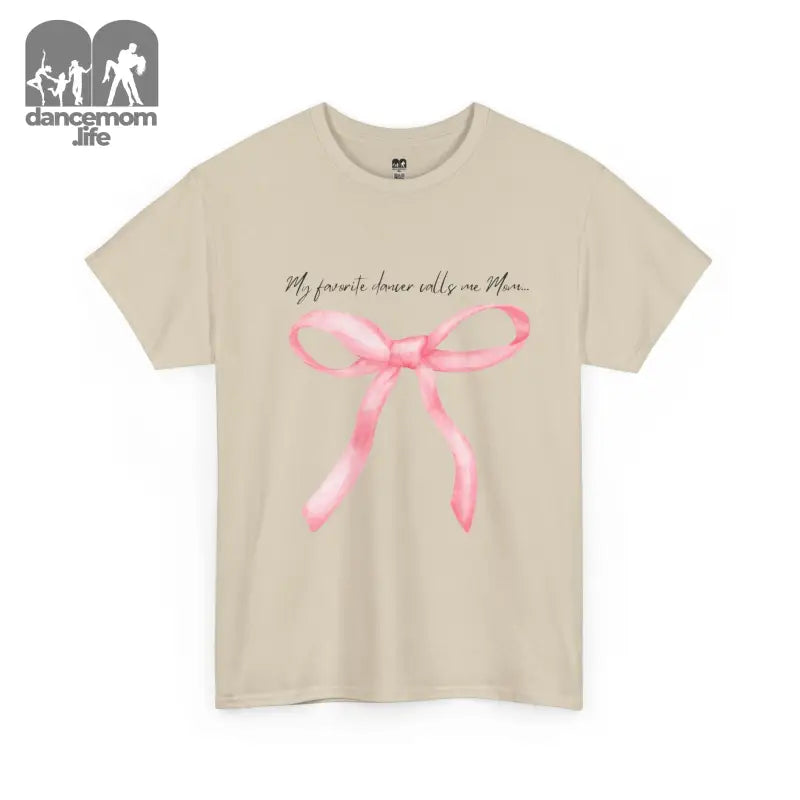 Beige t-shirt with a pink bow graphic and text design.