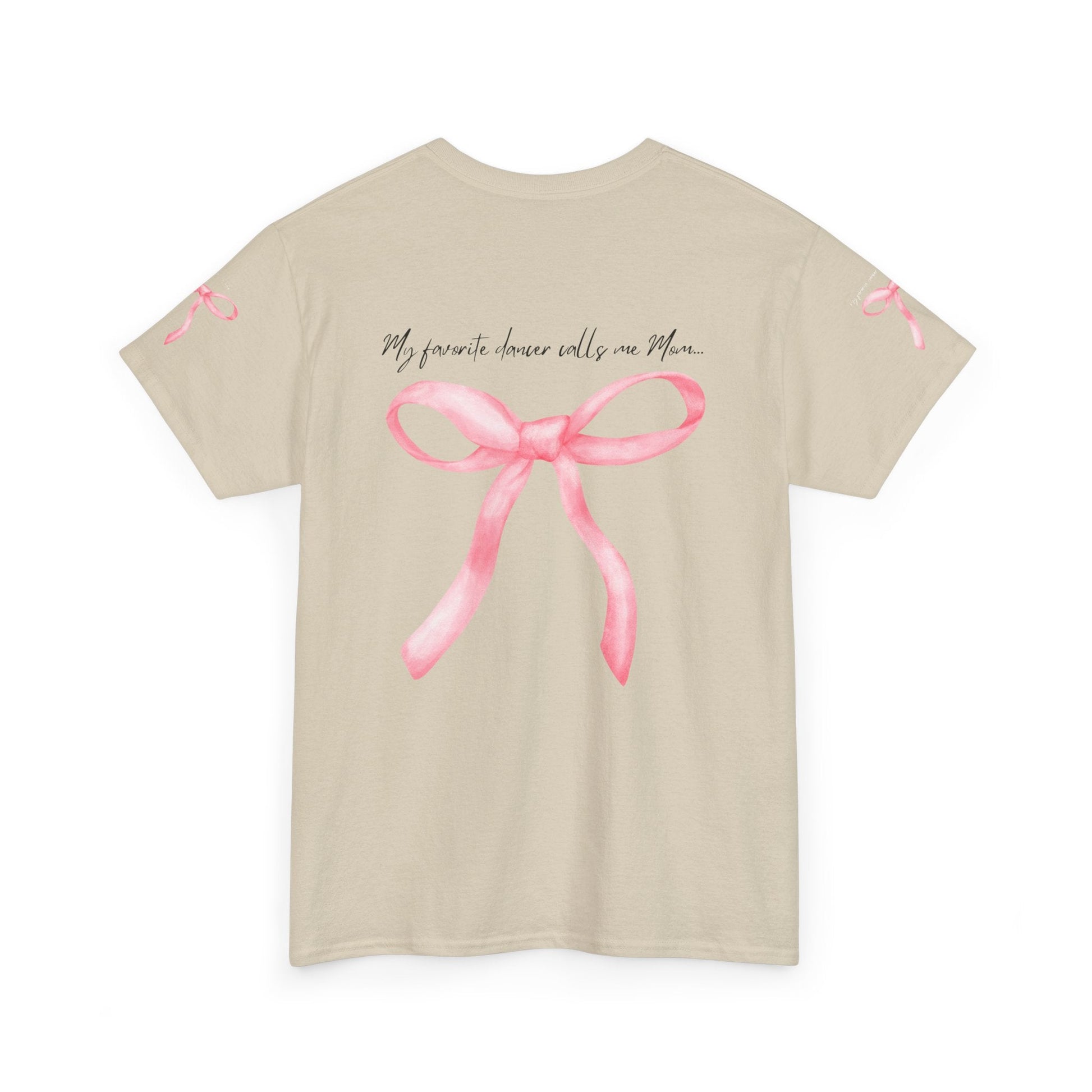 Beige short-sleeved t-shirt featuring a watercolor-style pink ribbon bow and the phrase ’my favorite dancer calls me mom...’ printed across the back.
