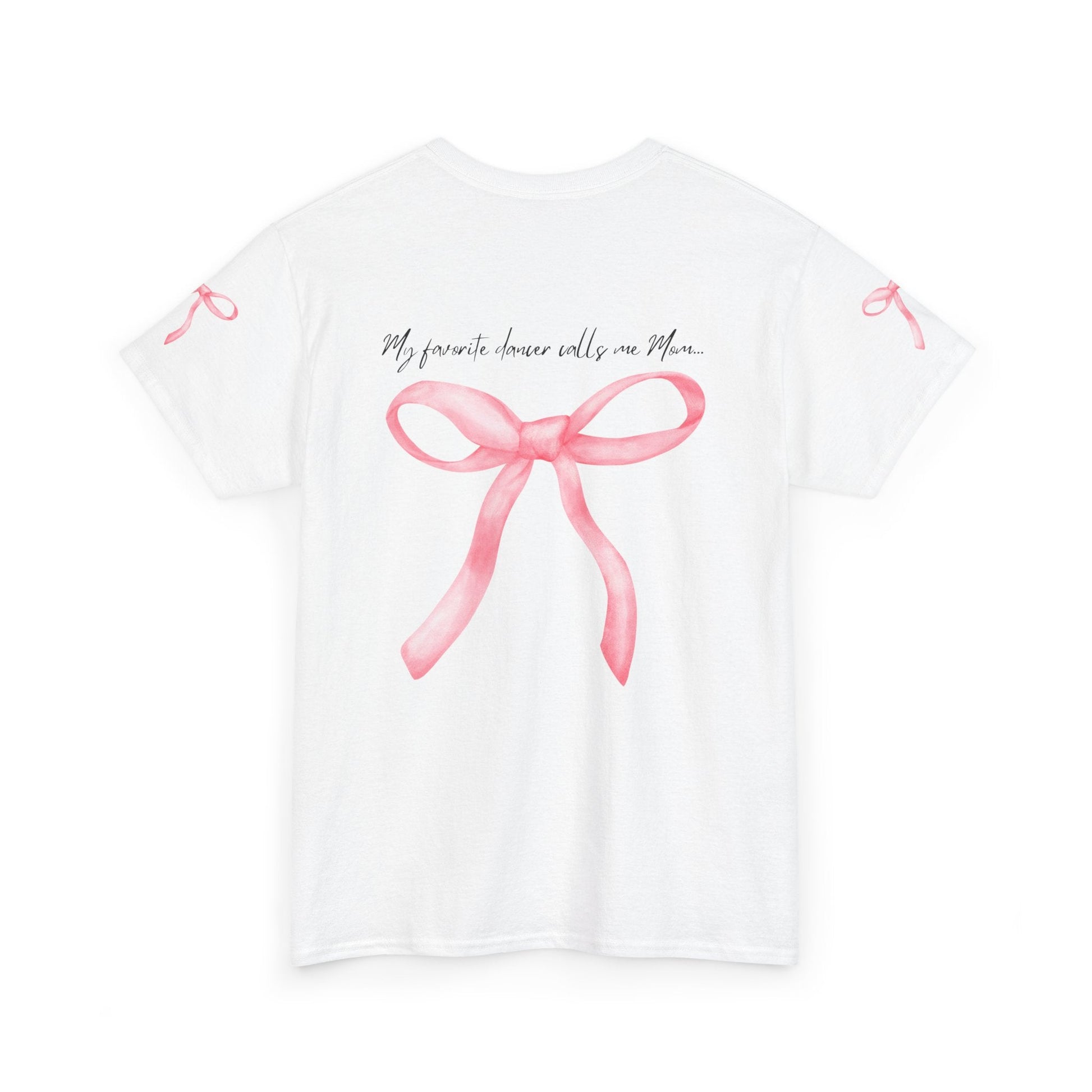White short-sleeved t-shirt featuring a watercolor-style pink ribbon bow graphic with the text ’my favorite dancer calls me mom...’ printed above it.