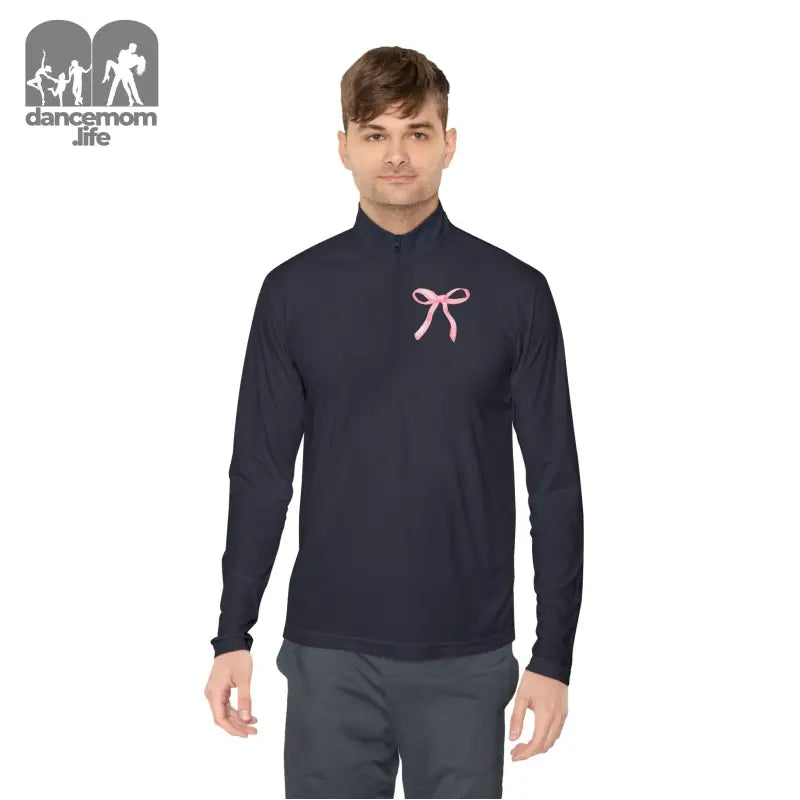 Navy blue mock turtleneck with a pink ribbon accent.